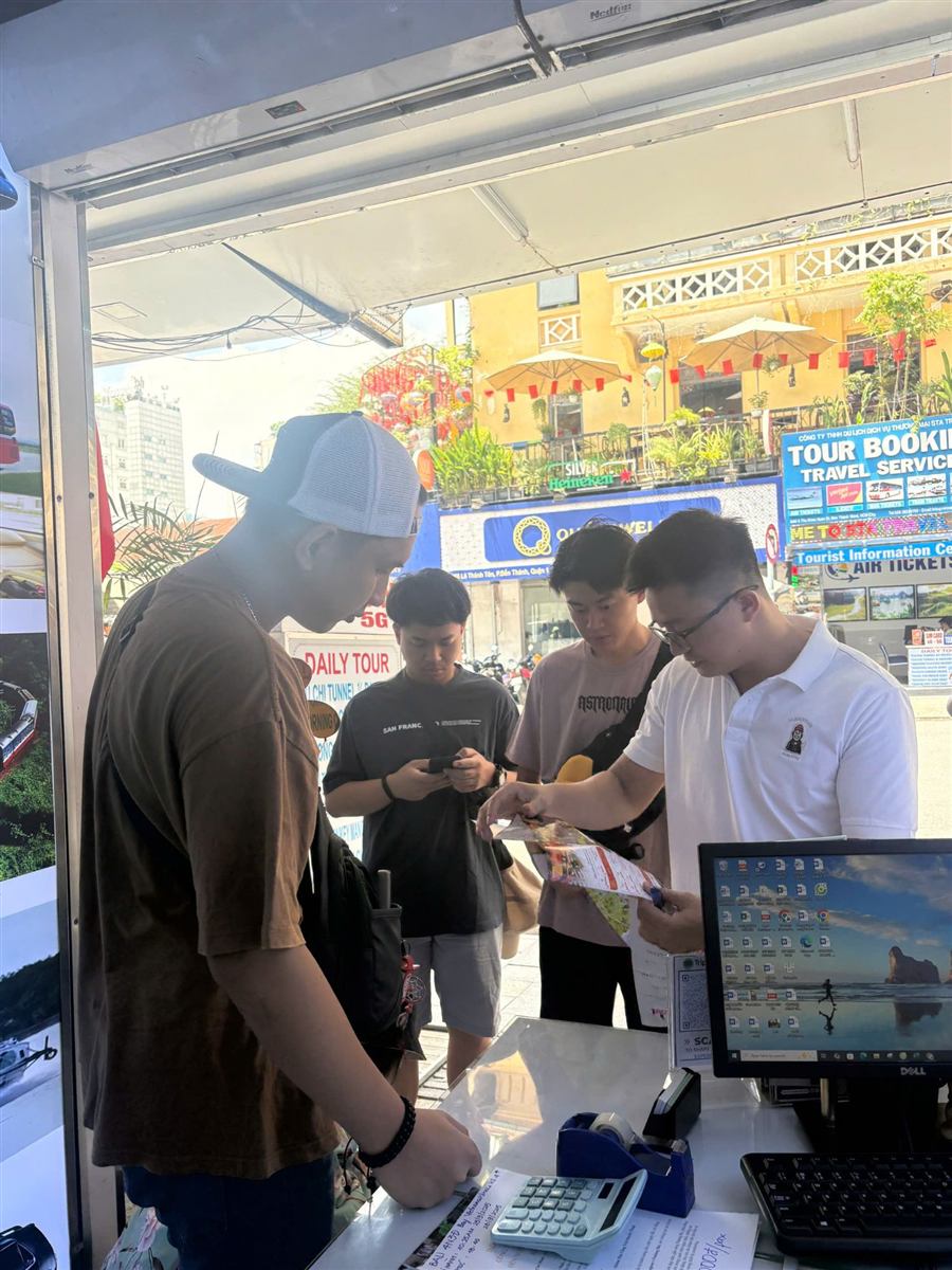 Travelers planning their tours at our counter